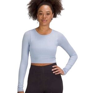 NWOT Lululemon Wunder Train Cropped Long Sleeve Shirt in Pastel Blue and size 12